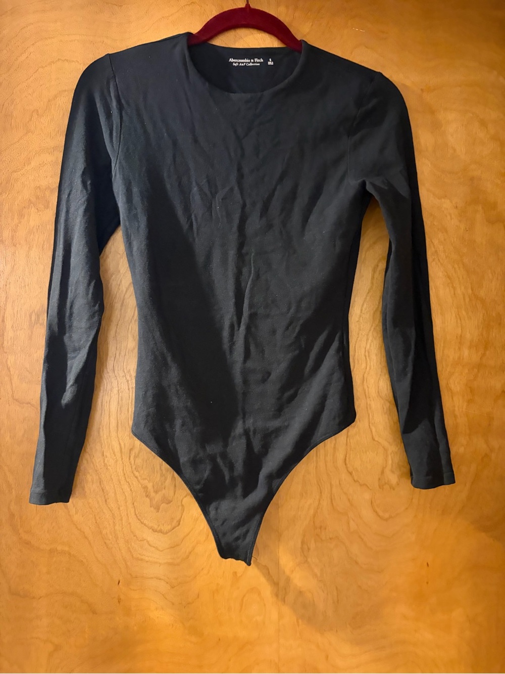 Abercrombie & Fitch Black Long-Sleeve Bodysuit with snap closure